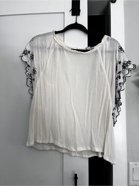 Umgee White Blouse with Navy Embroidered Flutter Sleeves